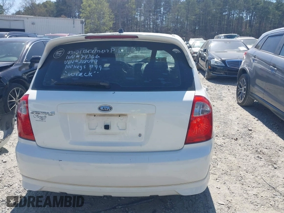 2006 Kia Spectra with VIN KNAFE162765318099, listed as a IAAI auction lot 41890796 with 241,431 mi miles. Bid and sale history available at carsss.com. Image 16.