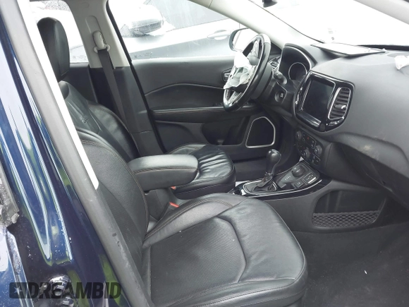 2021 Jeep Compass Limited with VIN 3C4NJDCB3MT594308, listed as a IAAI auction lot 41260655 with 79,990 mi miles and . Bid and sale history available at DreamBid. Image 5.
