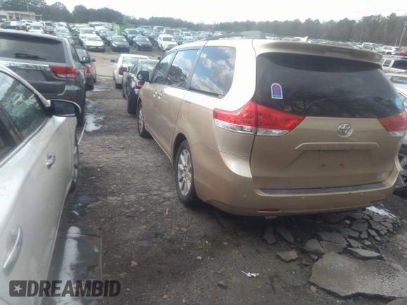 2011 Toyota Sienna XLE with VIN 5TDDK3DC3BS029476, listed as a IAAI auction lot 41393568 with 124,328 mi miles. Bid and sale history available at carsss.com. Image 3.