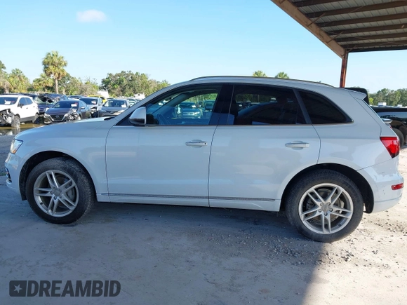 2015 Audi Q5 Premium Plus z VIN WA1LFAFP7FA059789, wystawiony jako IAAI lot #42574522 z przebiegiem 99 638 mil mil oraz . Historia ofert i sprzedaży dostępna na DreamBid. Obrazek 14.