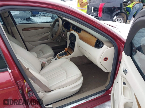 2003 Jaguar X-Type 2.5L Manual z VIN SAJEA51D63XC89273, wystawiony jako IAAI lot #41298544 z przebiegiem 124 400 mil mil oraz . Historia ofert i sprzedaży dostępna na DreamBid. Obrazek 5.