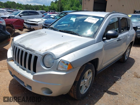 2008 Jeep Compass Sport with VIN 1J8FF47W08D749405, listed as a IAAI auction lot 42216678 with 172,185 mi miles and . Bid and sale history available at DreamBid. Image 2.