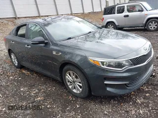 2016 Kia Optima LX z VIN KNAGT4L33G5077295, wystawiony jako IAAI lot #42127976 z przebiegiem 58 701 mil mil oraz . Historia ofert i sprzedaży dostępna na DreamBid. Obrazek 1.
