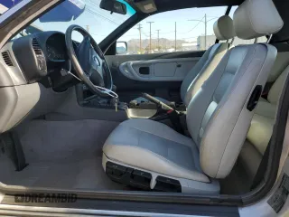 1999 BMW 3 Series 323ic with VIN WBABJ7333XEA17621, listed as a Copart auction lot 71743504 with 108,354 mi miles and Salvage Title. Bid and sale history available at carsss.com. Image 7.