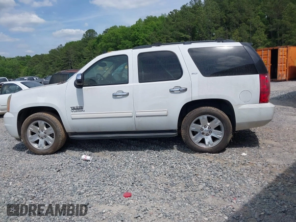 2011 GMC Yukon SLT with VIN 1GKS1CE0XBR156954, listed as a IAAI auction lot 42096120 with 288,142 mi miles. Bid and sale history available at carsss.com. Image 14.