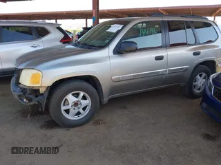 2003 GMC Envoy SLT with VIN 1GKDS13S732346641, listed as a IAAI auction lot 42111222 with 291,231 mi miles and . Bid and sale history available at DreamBid. Image 18.