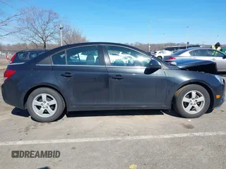 2014 Chevrolet Cruze 1LT with VIN 1G1PC5SB5E7482067, listed as a IAAI auction lot 41697625 with 51,036 mi miles and . Bid and sale history available at DreamBid. Image 13.
