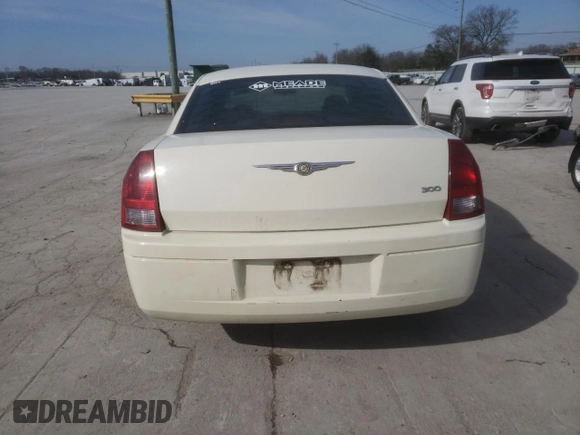 2005 Chrysler 300 with VIN 2C3JA43R25H663094, listed as a Copart auction lot 60813664 with 218,830 mi miles and Salvage Title. Bid and sale history available at carsss.com. Image 6.