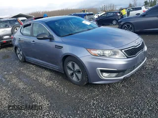 2012 Kia Optima Hybrid with VIN KNAGM4AD5C5022673, listed as a IAAI auction lot 41506860 with 121,982 mi miles. Bid and sale history available at carsss.com. Image 1.