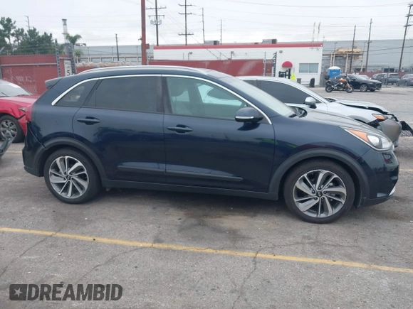 2017 Kia Niro Touring with VIN KNDCE3LC6H5048381, listed as a IAAI auction lot 42035129 with 133,559 mi miles. Bid and sale history available at carsss.com. Image 13.