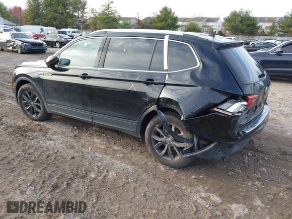2022 Volkswagen Tiguan SE with VIN 3VV3B7AX8NM163352, listed as a IAAI auction lot 40946586 with 27,847 mi miles and . Bid and sale history available at DreamBid. Image 3.