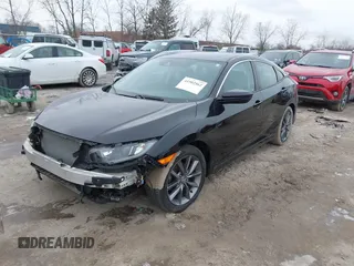 2019 Honda Civic Sedan EX with VIN 19XFC1F31KE013956, listed as a IAAI auction lot 41502562 with 65,752 mi miles. Bid and sale history available at carsss.com. Image 2.