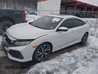 2018 Honda Civic Si with VIN 2HGFC1E50JH706377, listed as a IAAI auction lot 41384413 with 76,115 mi miles and . Bid and sale history available at DreamBid. Image 2.