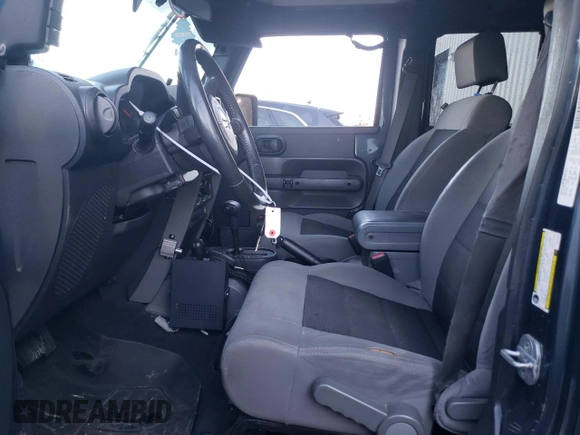 2008 Jeep Wrangler Unlimited X с VIN 1J8GA39138L562843, выставлен на аукционе Copart как лот 89177555 с пробегом 159 560 миль миль и Списание • Salvage title. История ставок и продаж доступна на DreamBid. Изображение 7.