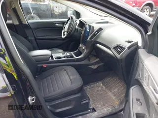 2021 Ford Edge SE z VIN 2FMPK4G9XMBA15819, wystawiony jako IAAI lot #41921371 z przebiegiem 63 373 mil mil oraz . Historia ofert i sprzedaży dostępna na DreamBid. Obrazek 5.