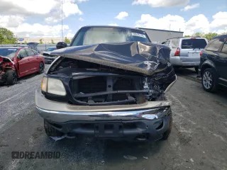 2000 Ford F-150 XL z VIN 1FTRX18L7YNB44005, wystawiony jako Copart lot #56535195 z przebiegiem 187 429 mil mil oraz Szkoda całkowita • Salvage title. Historia ofert i sprzedaży dostępna na DreamBid. Obrazek 5.