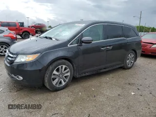 2014 Honda Odyssey Touring with VIN 5FNRL5H91EB063390, listed as a Copart auction lot 54482545 with Not provided miles and Salvage title. Bid and sale history available at DreamBid. Image 1.