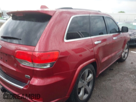 2014 Jeep Grand Cherokee Overland with VIN 1C4RJFCG9EC460165, listed as a IAAI auction lot 42092137 with 131,802 mi miles and . Bid and sale history available at DreamBid. Image 14.
