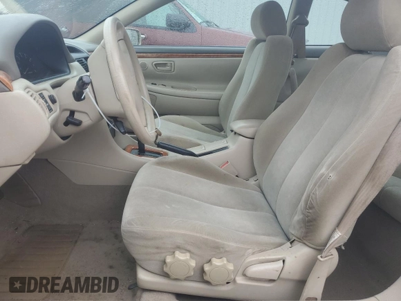 2002 Toyota Solara SE z VIN 2T1CE22P52C007118, wystawiony jako Copart lot #57048195 z przebiegiem 246 404 mil mil oraz Szkoda całkowita • Salvage title. Historia ofert i sprzedaży dostępna na DreamBid. Obrazek 7.