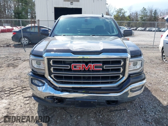 2018 GMC Sierra 1500 SLE z VIN 1GTV2MEC3JZ143967, wystawiony jako IAAI lot #41853850 z przebiegiem 80 205 mil mil oraz . Historia ofert i sprzedaży dostępna na DreamBid. Obrazek 12.