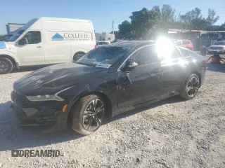 2024 Kia K5 GT-Line z VIN 5XXG64J20RG243372, wystawiony jako Copart lot #48847225 z przebiegiem 12 145 mil mil oraz Szkody całkowita. Historia ofert i sprzedaży dostępna na DreamBid. Obrazek 1.
