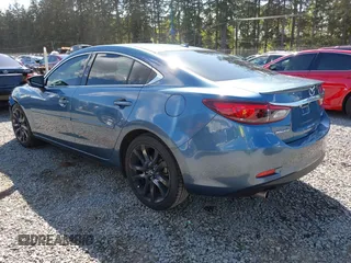 2016 Mazda Mazda6 i Grand Touring with VIN JM1GJ1W51G1436977, listed as a IAAI auction lot 42097363 with 128,941 mi miles. Bid and sale history available at carsss.com. Image 3.