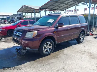 2007 Honda Pilot EX-L with VIN 5FNYF18777B011257, listed as a IAAI auction lot 41858928 with 192,832 mi miles. Bid and sale history available at carsss.com. Image 2.