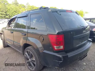 2005 Jeep Grand Cherokee Laredo z VIN 1J4GR48K65C725099, wystawiony jako IAAI lot #42509223 z przebiegiem 249 216 mil mil oraz . Historia ofert i sprzedaży dostępna na DreamBid. Obrazek 3.