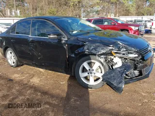 2012 Volkswagen Jetta TDI w/Premium with VIN 3VWLL7AJ2CM426050, listed as a IAAI auction lot 41332817 with 111,996 mi miles and . Bid and sale history available at DreamBid. Image 1.