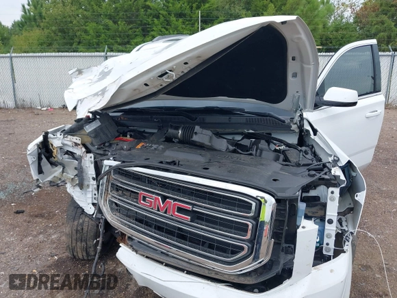 2019 GMC Yukon XL SLT with VIN 1GKS2GKC2KR369285, listed as a IAAI auction lot 40279008 with Not Provided miles and . Bid and sale history available at DreamBid. Image 10.