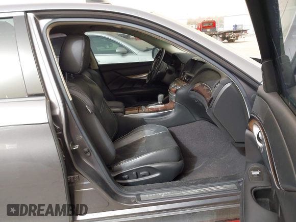 2015 Infiniti M35h Hybrid with VIN JN1EY1AP2FM510029, listed as a IAAI auction lot 41795913 with 152,475 mi miles. Bid and sale history available at carsss.com. Image 5.