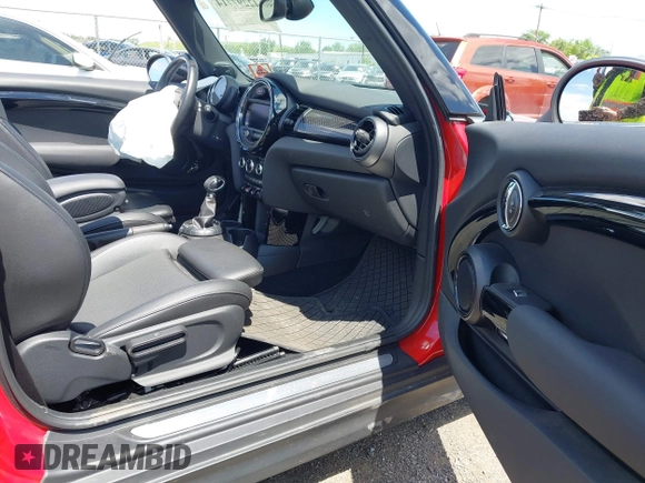 2017 MINI Convertible Cooper S with VIN WMWWG9C53H3C22950, listed as a IAAI auction lot 42297714 with 22,613 mi miles and . Bid and sale history available at DreamBid. Image 5.