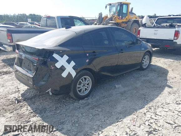2021 Toyota Prius L Eco with VIN JTDKAMFU6M3141392, listed as a IAAI auction lot 42317866 with 137,495 mi miles and . Bid and sale history available at DreamBid. Image 4.