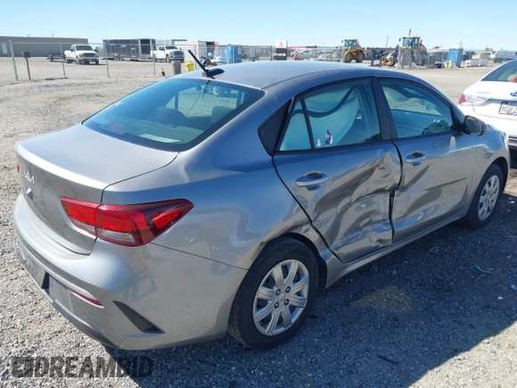 2023 Kia Rio S with VIN 3KPA24AD5PE524320, listed as a IAAI auction lot 41881897 with 48,615 mi miles. Bid and sale history available at carsss.com. Image 4.