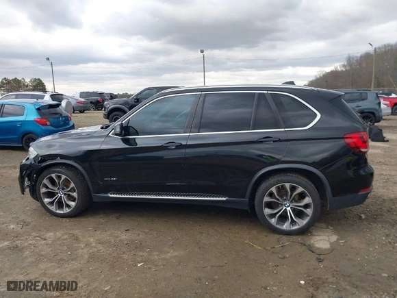 2016 BMW X5 xDrive35i with VIN 5UXKR0C59G0P29077, listed as a IAAI auction lot 41710102 with 254,641 mi miles. Bid and sale history available at carsss.com. Image 14.