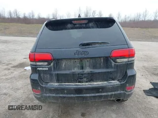 2019 Jeep Grand Cherokee Laredo E with VIN 1C4RJFAGXKC674676, listed as a IAAI auction lot 41942125 with 72,151 mi miles. Bid and sale history available at carsss.com. Image 17.