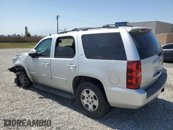 2014 Chevrolet Tahoe LT with VIN 1GNSCBE09ER118630, listed as a Copart auction lot 58906965 with 92,734 mi miles and Salvage title. Bid and sale history available at DreamBid. Image 2.