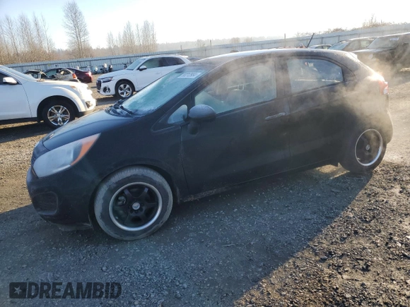 2014 Kia Rio LX with VIN KNADM5A39E6358548, listed as a Copart auction lot 83212984 with 132,272 mi miles and Salvage Title. Bid and sale history available at carsss.com. Image 1.