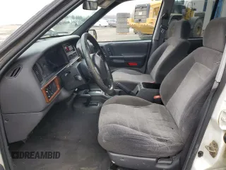 1997 Jeep Grand Cherokee Laredo with VIN 1J4GZ58SXVC597519, listed as a Copart auction lot 88437475 with 172,051 mi miles and Salvage Title. Bid and sale history available at carsss.com. Image 7.