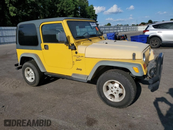 2000 Jeep Wrangler Sport with VIN 1J4FA49SXYP745676, listed as a Copart auction lot 63096755 with 147,226 mi miles and Salvage title. Bid and sale history available at DreamBid. Image 4.
