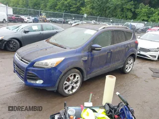 2016 Ford Escape Titanium with VIN 1FMCU9J95GUB65432, listed as a IAAI auction lot 42503176 with 96,362 mi miles and . Bid and sale history available at DreamBid. Image 16.