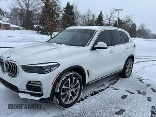2021 BMW X5 xDrive40i with VIN 5UXCR6C03M9G52955, listed as a Copart auction lot 41009913 with 7,476 mi miles. Bid and sale history available at carsss.com. Image 2.