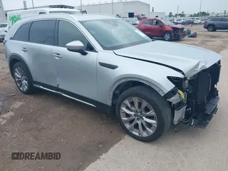 2024 Mazda CX-90 Premium with VIN JM3KKDHD3R1161877, listed as a IAAI auction lot 42624535 with 29,474 mi miles and . Bid and sale history available at DreamBid. Image 1.