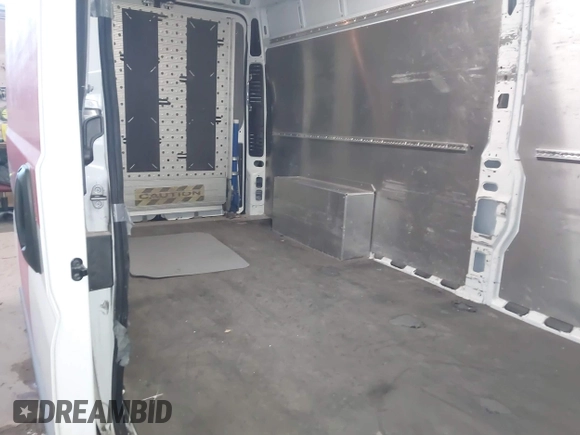 2018 Ram ProMaster Cargo with VIN 3C6URVJGXJE153615, listed as a IAAI auction lot 41309702 with 122,597 mi miles. Bid and sale history available at carsss.com. Image 8.