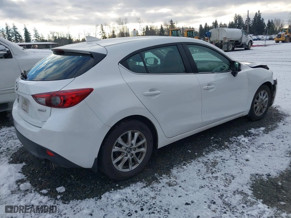 2016 Mazda Mazda3 i Grand Touring with VIN 3MZBM1N77GM319103, listed as a IAAI auction lot 41472772 with 82,833 mi miles. Bid and sale history available at carsss.com. Image 4.