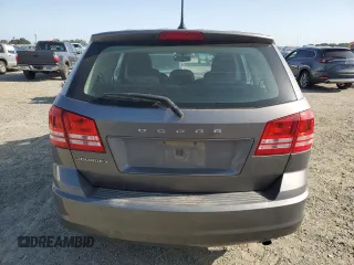 2013 Dodge Journey American Value with VIN 3C4PDCAB8DT590509, listed as a Copart auction lot 57347375 with 203,642 mi miles and Clean title. Bid and sale history available at DreamBid. Image 6.