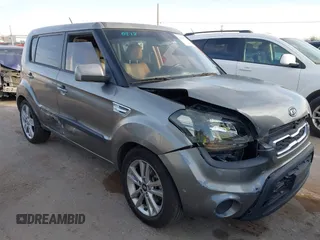 2011 Kia Soul + with VIN KNDJT2A27B7215666, listed as a IAAI auction lot 41600060 with 185,480 mi miles. Bid and sale history available at carsss.com. Image 1.