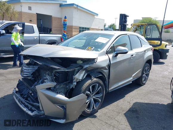2017 Lexus RX 350 z VIN 2T2ZZMCA3HC041664, wystawiony jako IAAI lot #42379331 z przebiegiem 153 887 mil mil oraz . Historia ofert i sprzedaży dostępna na DreamBid. Obrazek 23.
