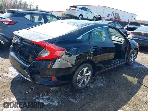 2020 Honda Civic LX with VIN 2HGFC2F69LH532499, listed as a IAAI auction lot 41919941 with 96,936 mi miles and . Bid and sale history available at DreamBid. Image 4.