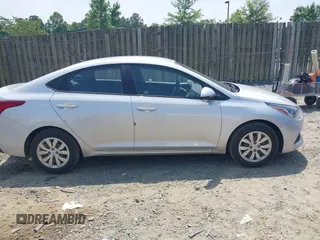 2018 Hyundai Accent SEL z VIN 3KPC24A35JE034306, wystawiony jako IAAI lot #42505216 z przebiegiem 53 999 mil mil oraz . Historia ofert i sprzedaży dostępna na DreamBid. Obrazek 13.